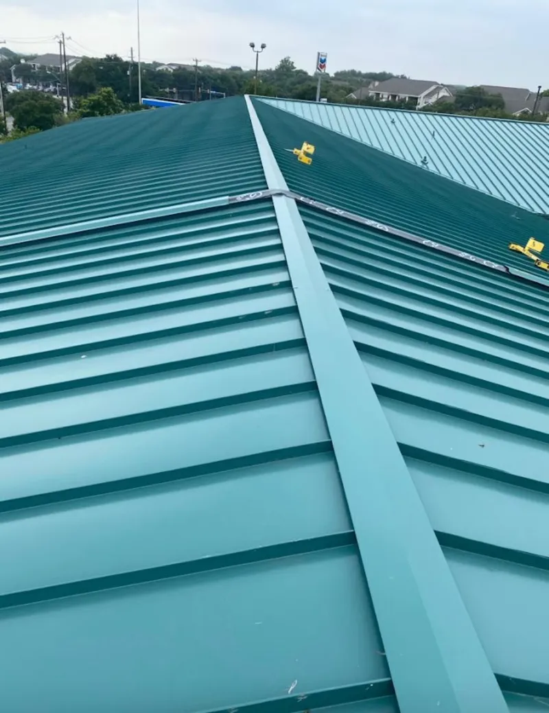 Green commercial metal roof ridge and valley for Metal Roof Repair in Halls